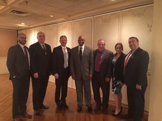 Photo of attorney Danielle Coysh with members of the Criminal Bar Association